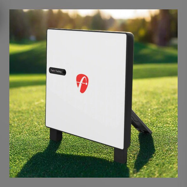 FlightScope X3C radar launch monitor set up outdoors on a golf course