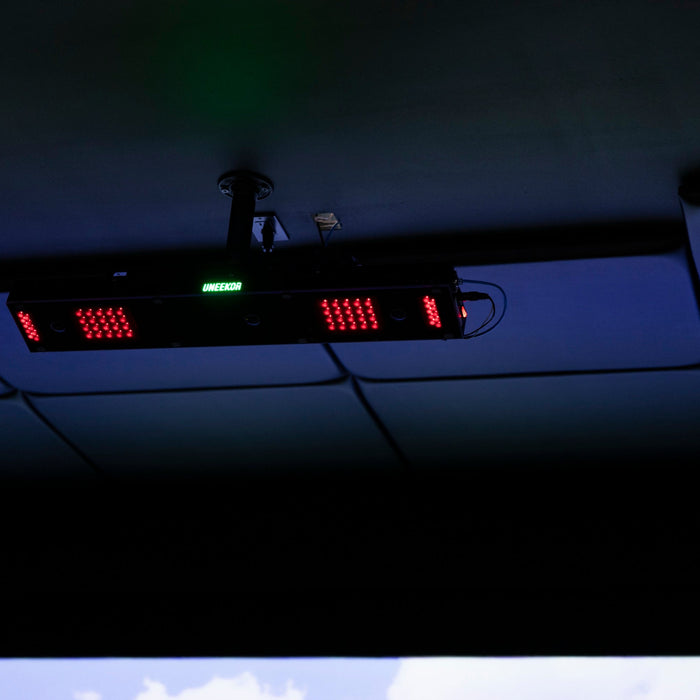 Uneekor EYE XO2 launch monitor mounted on the ceiling above a hitting area