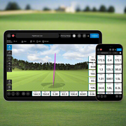 Mevo Gen2 Launch Monitor device on a golf course with digital display and smartphone showing app interface.