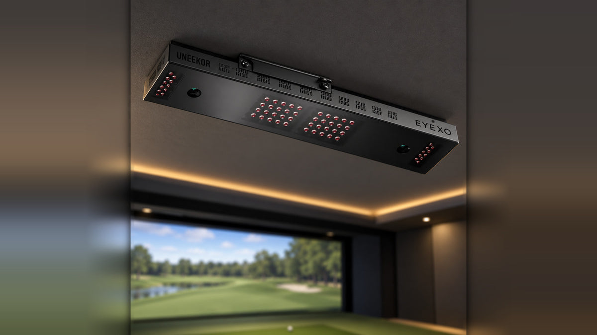 Uneekor Eye XO overhead golf launch monitor mounted on the ceiling of an indoor golf simulator room