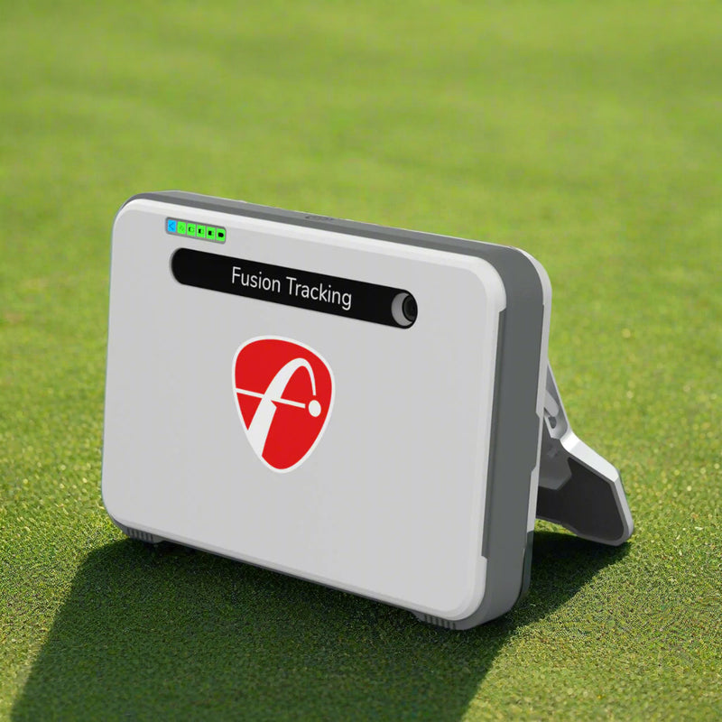 Mevo+ Fusion Tracking device on a grassy background