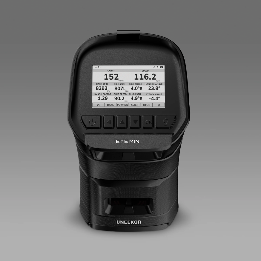 Close up front view of the Uneekor Eye Mini launch monitor showing the control buttons and on screen shot data readout