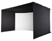 Carl’s curved golf simulator enclosure front view with a blank white impact screen, ready for projector setup