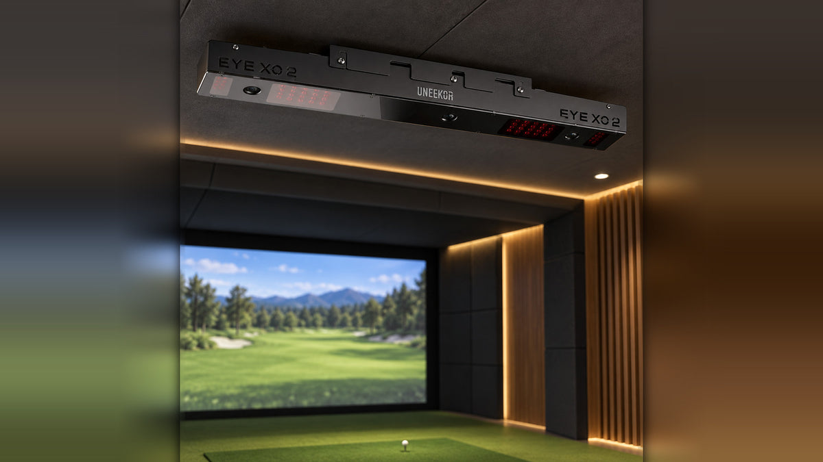 Uneekor Eye XO2 overhead golf launch monitor mounted above a simulator hitting area