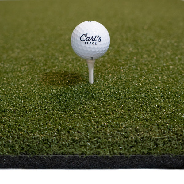 Country Club Elite golf hitting mat; pictured ball and tee sold separately