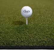 Country Club Elite hitting mat with a golf ball on a real tee