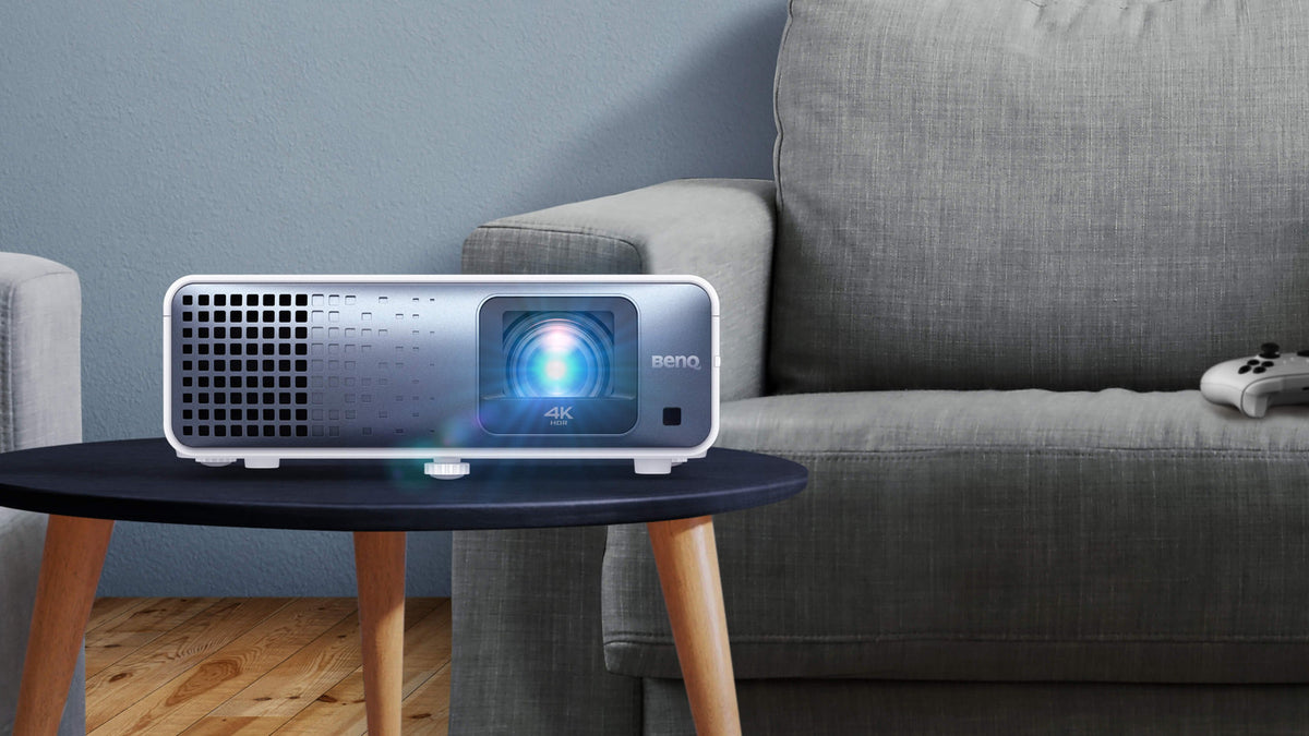 BenQ TK710STi 4K laser projector used for gaming and movie watching