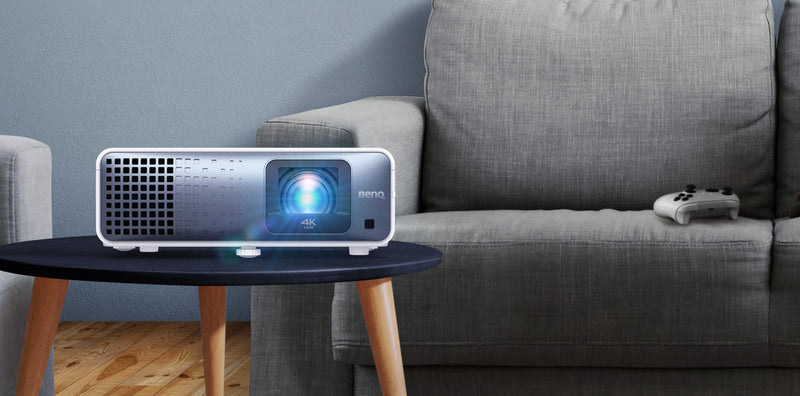 BenQ TK710STi 4K laser projector used for gaming and movie watching